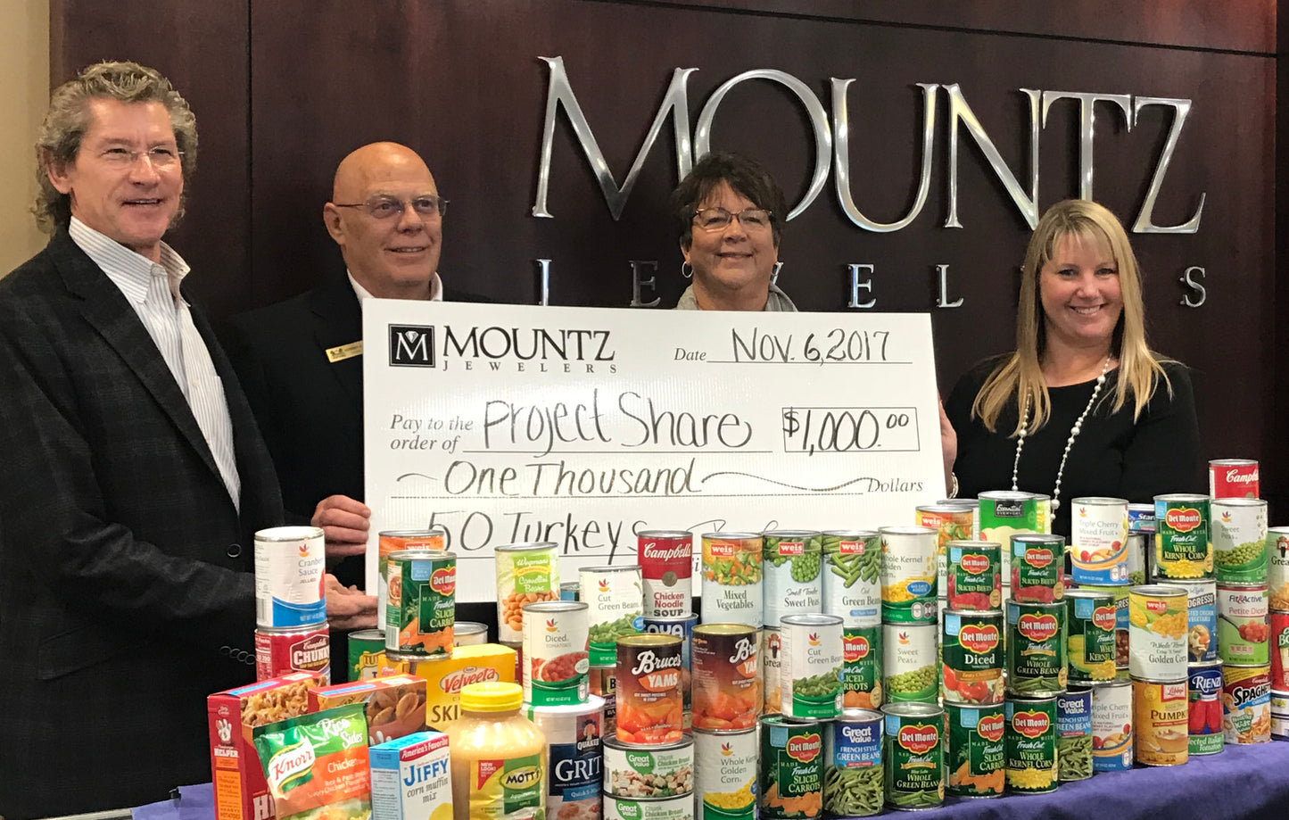 Mountz Jewelers donating to Project Share