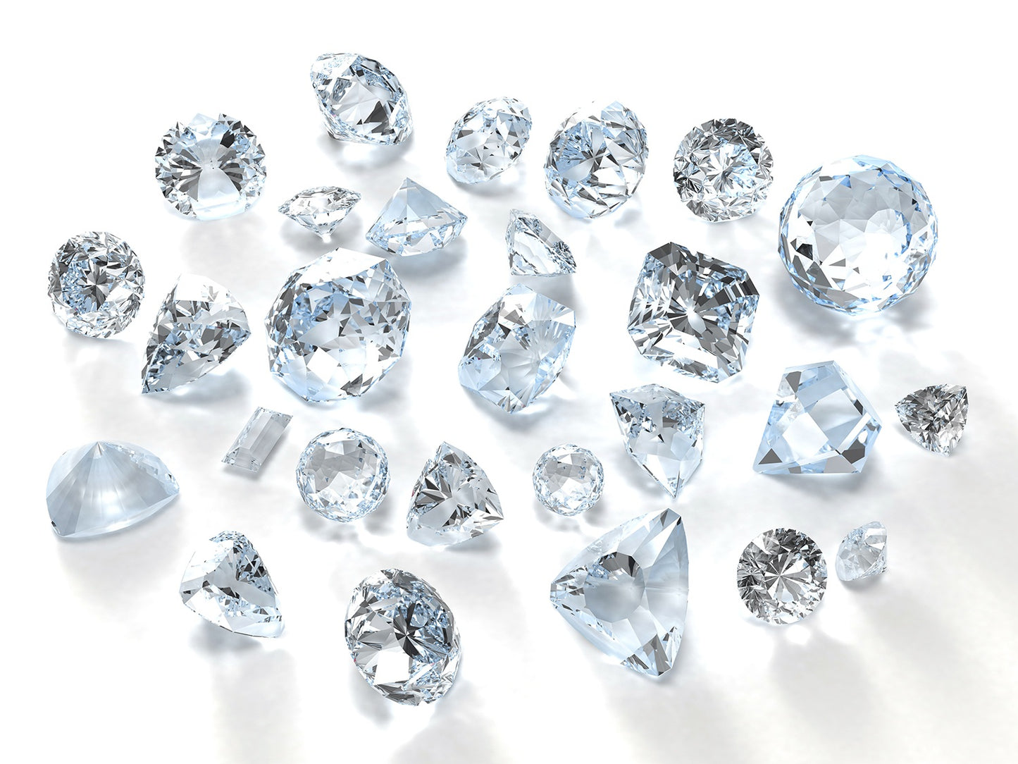 Loose diamonds in front of white background