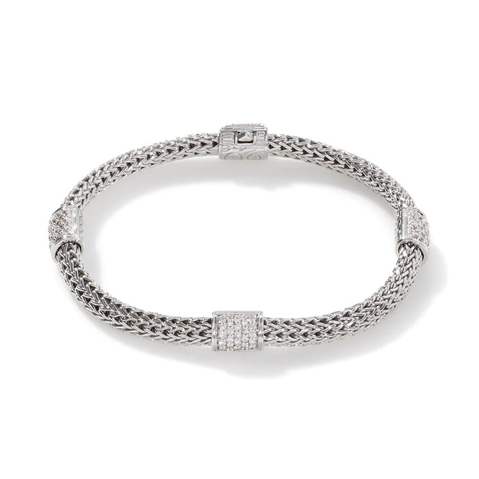 .73D 4-Station Pave Chain Bracelet S/S & 18K WG: (4) stations each containing (23) Rd pave set Diamonds evenly spaced across a 5MM Classic Chain. Sz UXL