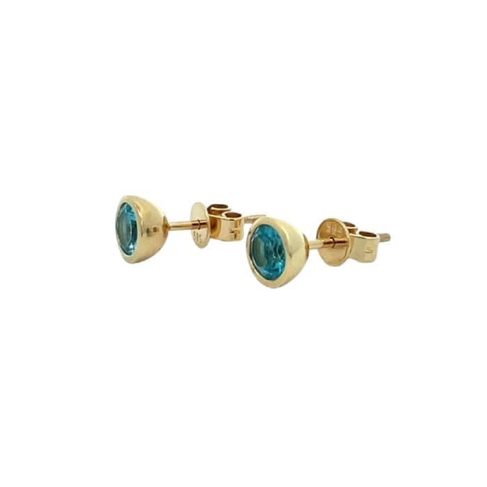 Load image into Gallery viewer, Mountz Collection Blue Topaz Bezel Set Stud Earrings in 14K Yellow Gold
